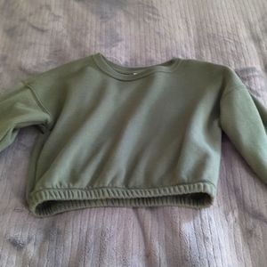 Green long-sleeve shirt